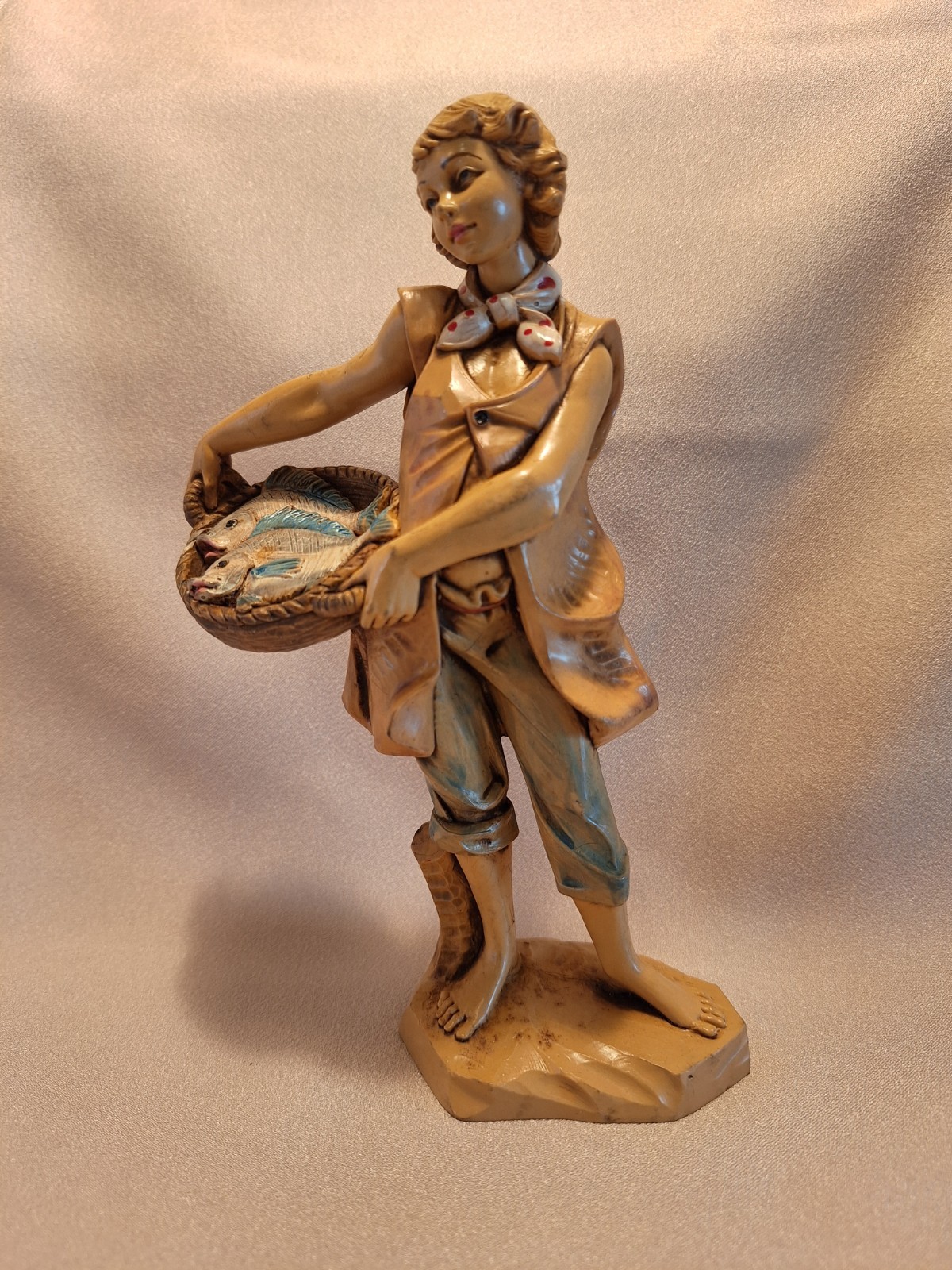 1986 Fontanini Figurine-Boy holding basket of fish #322 - 7.5" Collection 1986 Fontanini Figurine-Boy holding basket of fish #322 - 7.5" Collection