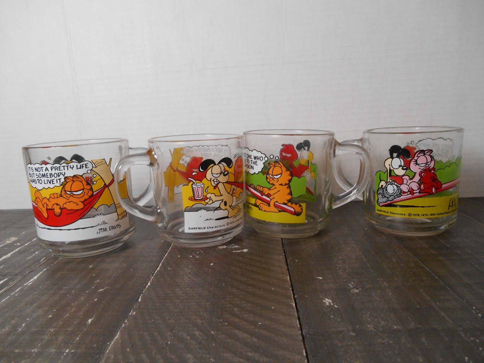 GARFIELD Jim Davis McDONALDS Drinking Glass/Mug Lot Set of 4 VINTAGE 1978-1980 GARFIELD Jim Davis McDONALDS Drinking Glass/Mug Lot Set of 4 VINTAGE 1978-1980