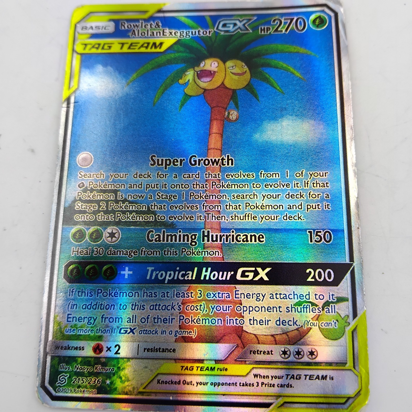 Rowlet & Alolan Exeggutor GX (Alternate Full Art) 215/236 Sm-Unified Minds Holo Rowlet & Alolan Exeggutor GX (Alternate Full Art) 215/236 Sm-Unified Minds Holo