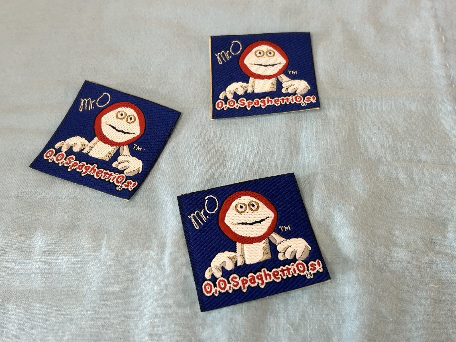 (1) Vintage 1980's Spaghetti O's Mascot " MR. O " Adhesive Iron On Woven Patch (1) Vintage 1980's Spaghetti O's Mascot " MR. O " Adhesive Iron On Woven Patch
