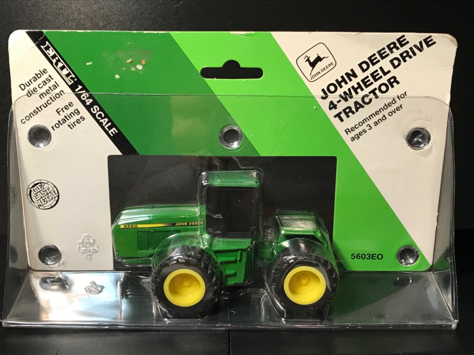 ERTL John Deere 1991 Tractor Die-Cast Metal, #5603, 1/64th Scale, NEW In PKG. ERTL John Deere 1991 Tractor Die-Cast Metal, #5603, 1/64th Scale, NEW In PKG.
