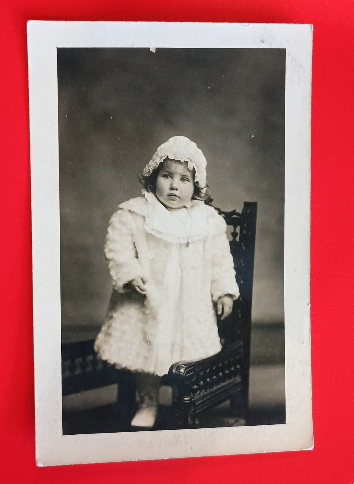 RPPC Young Girl Standing On Chair Wearing Bonnet And Coat Necklace 
