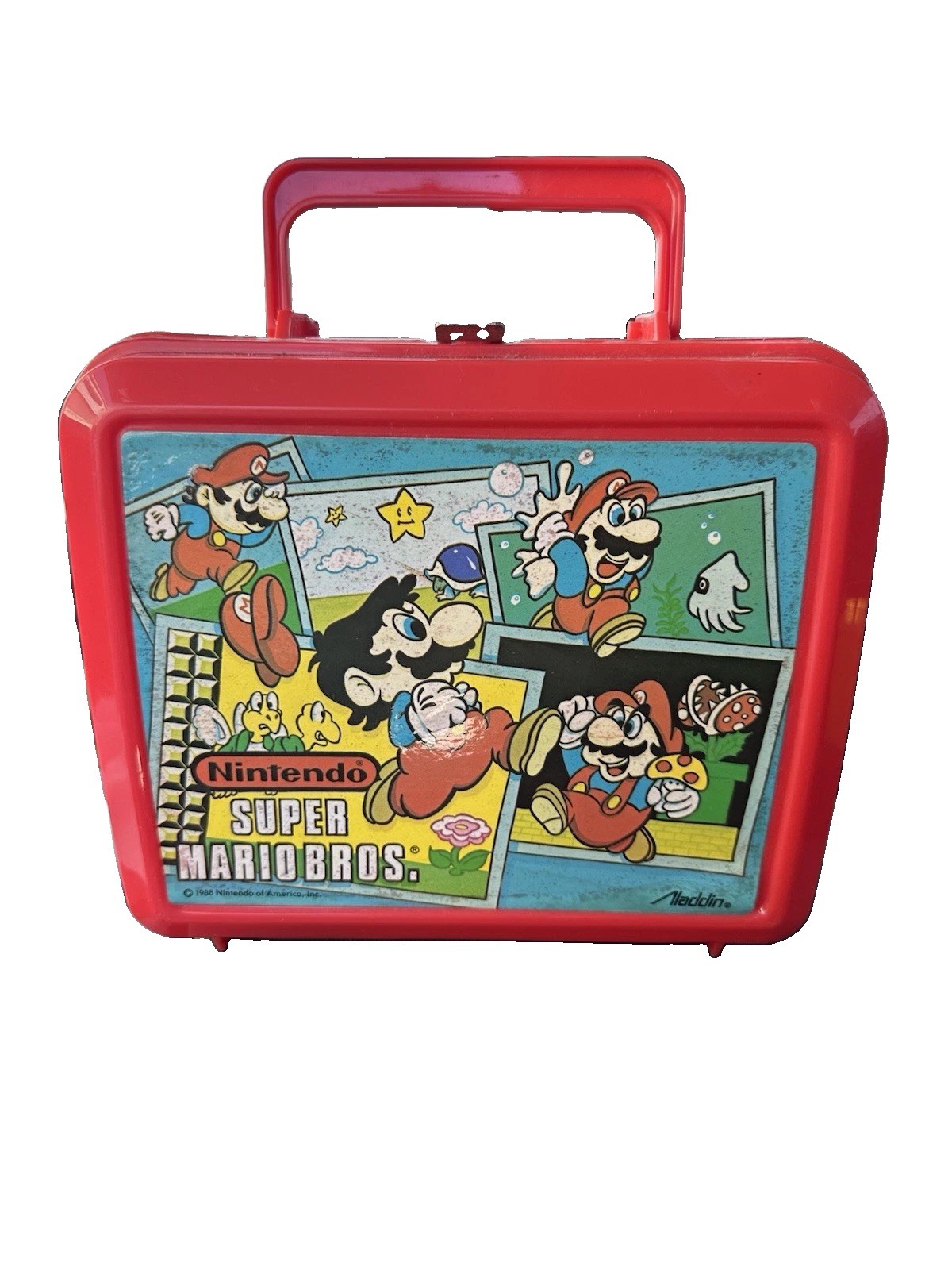 1988 Super Mario Bros Red Lunch Kit with Thermos, made by Aladdin 1988 Super Mario Bros Red Lunch Kit with Thermos, made by Aladdin