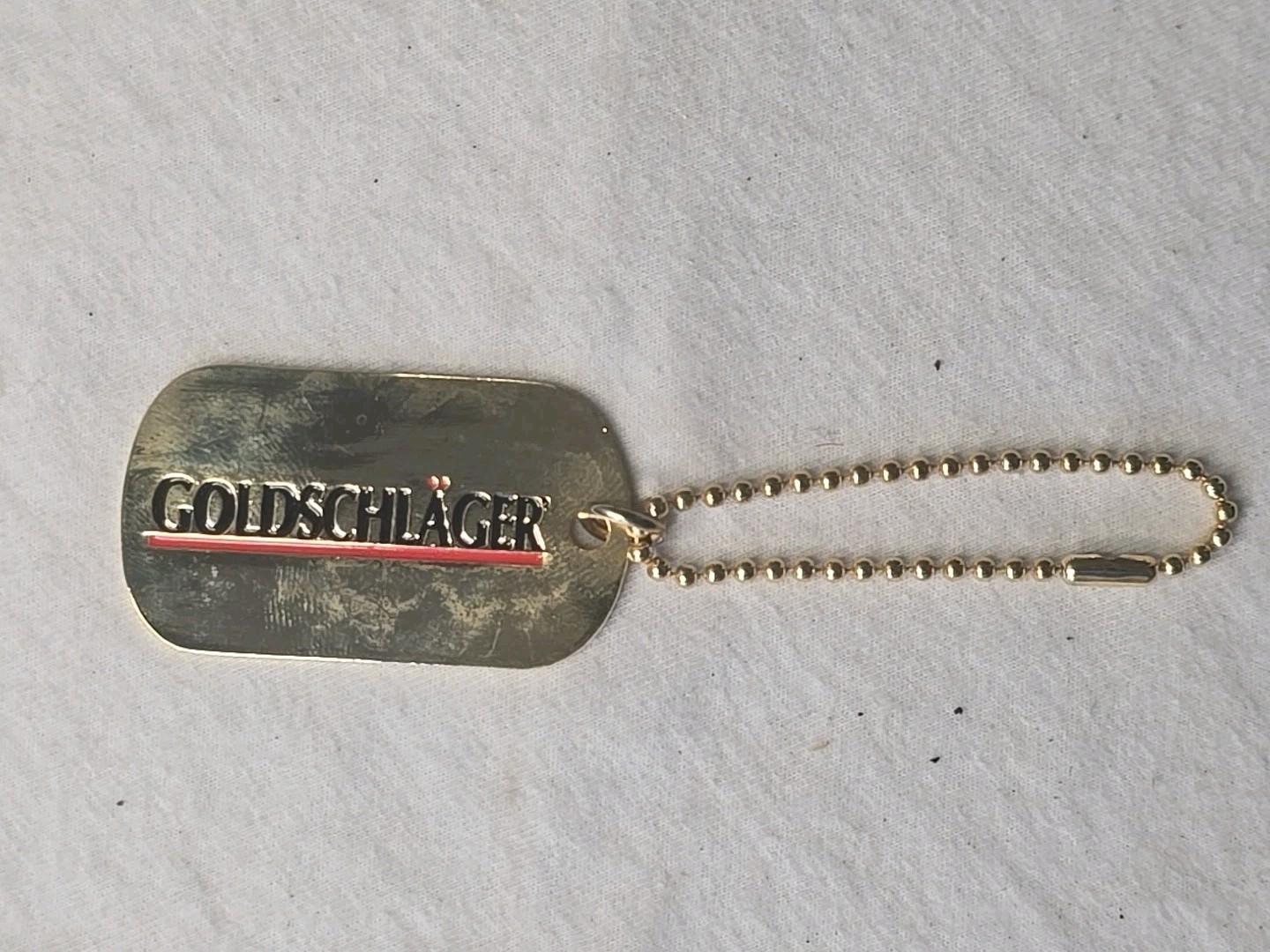 Vintage Goldschlager Keychain Stamped Metal Enamel Liquor Promo Barware NOS Vintage Goldschlager Keychain Stamped Metal Enamel Liquor Promo Barware NOS