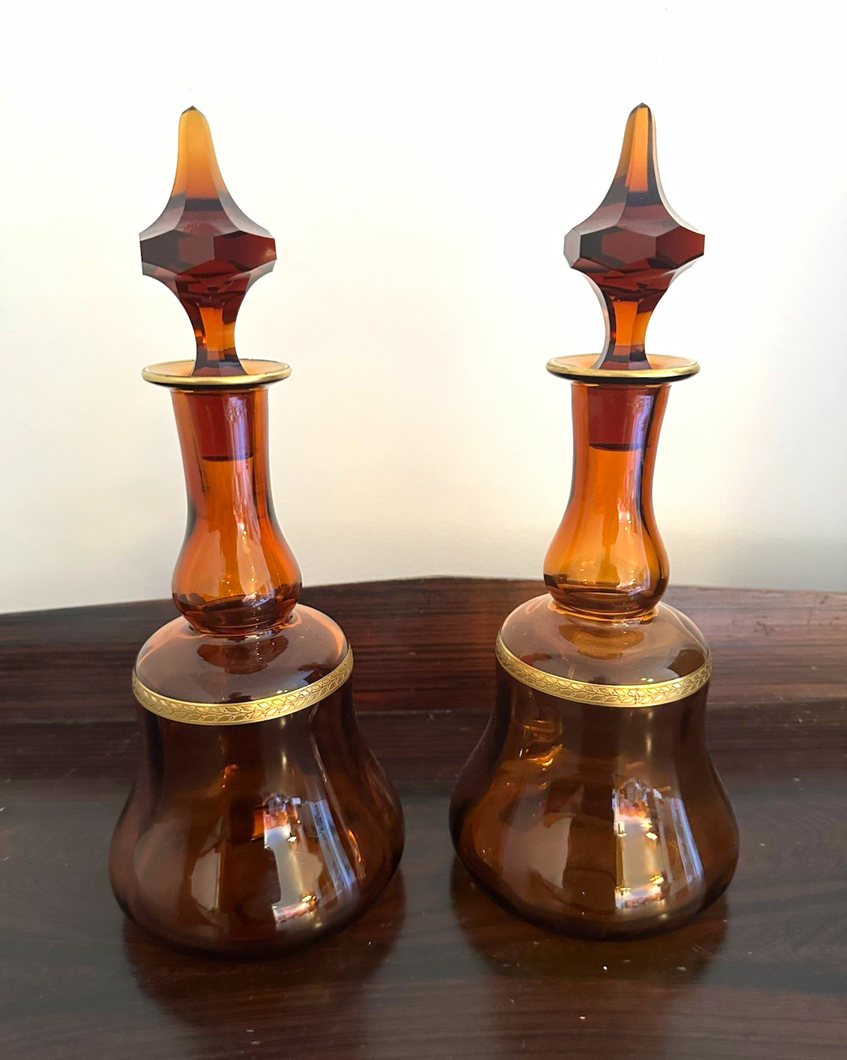 Vintage Amber Glass Decanter Bottles Pair Gold Trim Faceted Stoppers 13” Vintage Amber Glass Decanter Bottles Pair Gold Trim Faceted Stoppers 13”