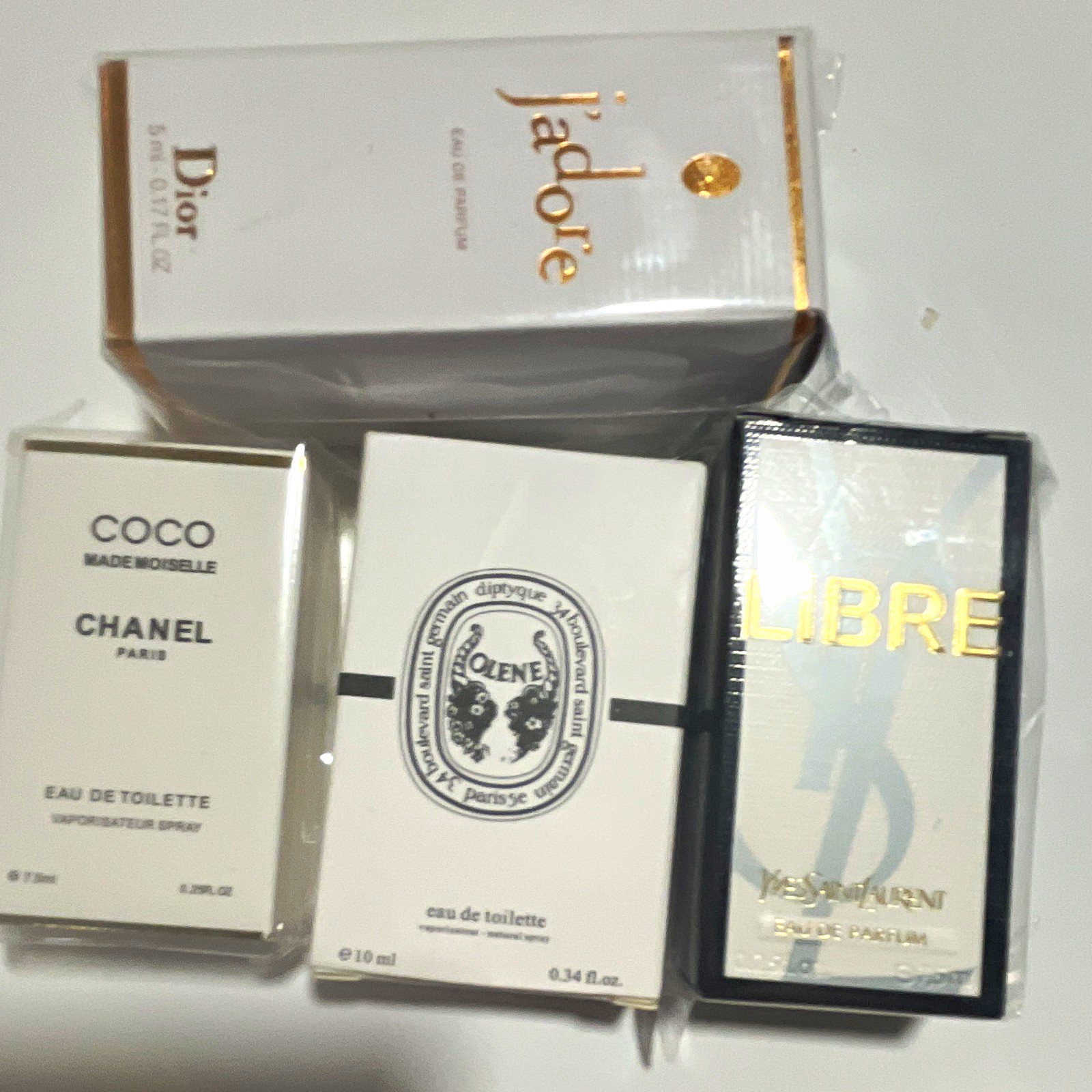 Mini Perfume Lot: Dior J’adore, CHANEL Coco Mademoiselle, Diptyque, YSL Libre Mini Perfume Lot: Dior J’adore, CHANEL Coco Mademoiselle, Diptyque, YSL Libre
