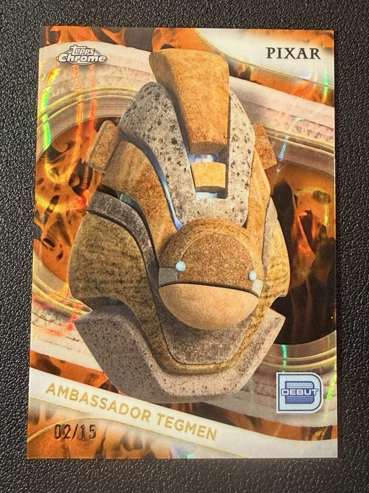 2025 Topps Chrome Disney Ambassador Tegmen Incinerator Lava Refractor #/15