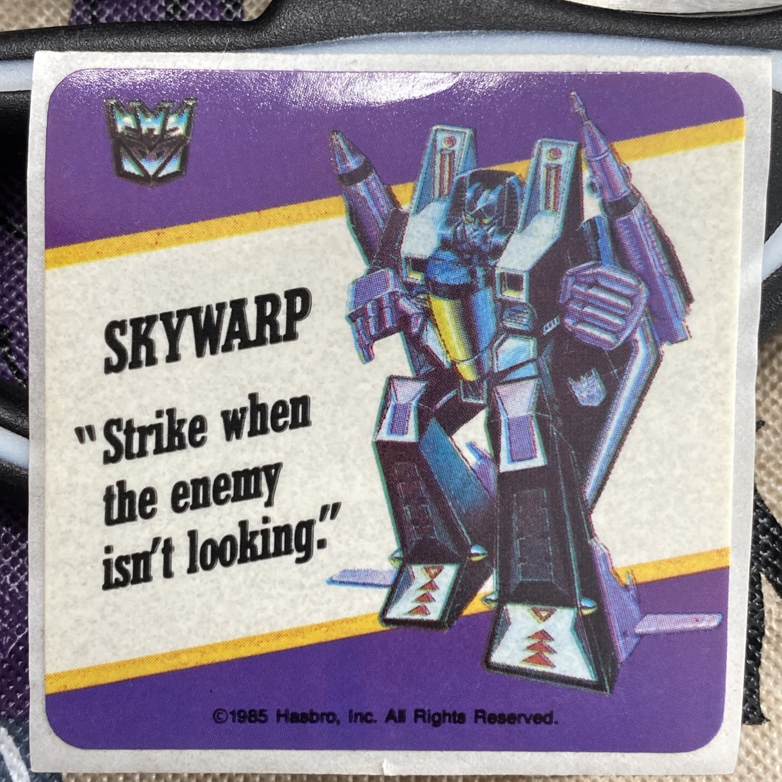 VERY RARE 1985 Transformers Purple SKYWARP G1 Motto Sticker Hasbro NEAR MINT VERY RARE 1985 Transformers Purple SKYWARP G1 Motto Sticker Hasbro NEAR MINT