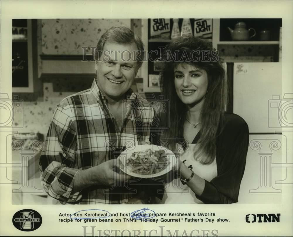 1989 Press Photo Ken Kercheval and host Sylvia in TNN's "Holiday Gourmet" 1989 Press Photo Ken Kercheval and host Sylvia in TNN's "Holiday Gourmet"
