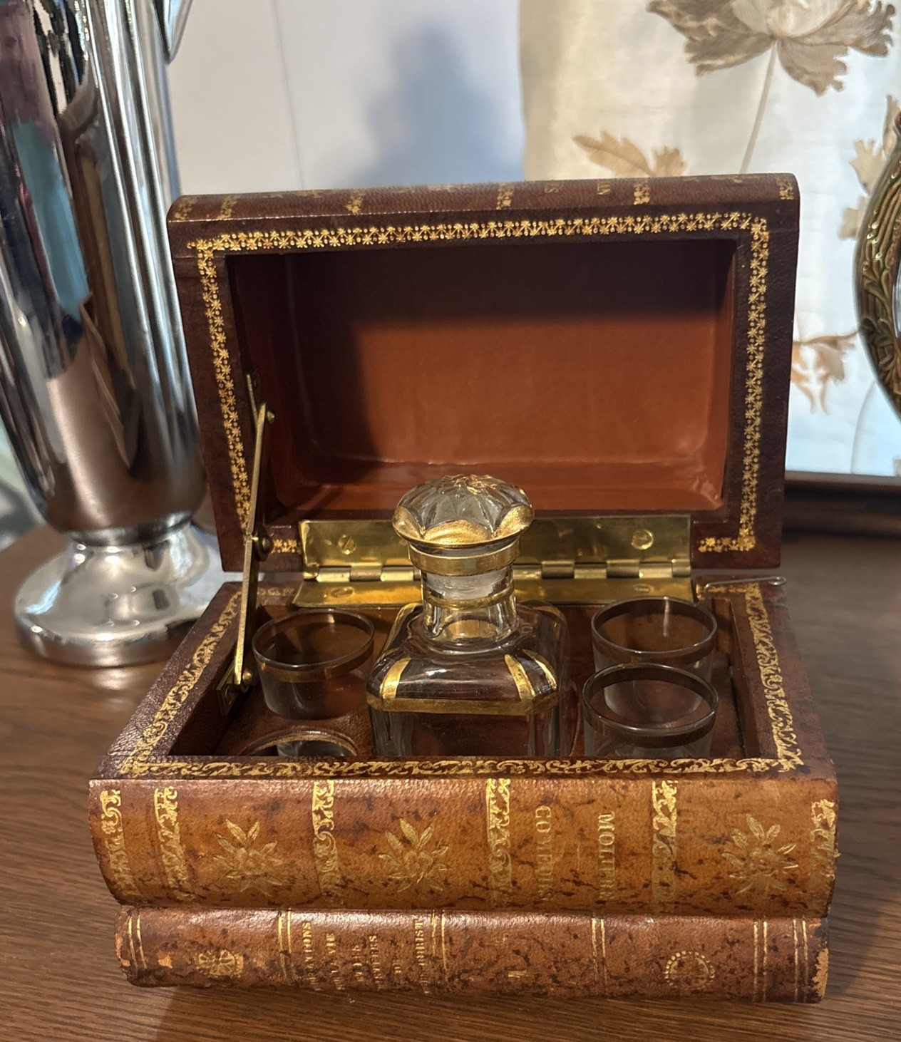 RARE French "Tantalus" or "Cave à Liqueur" Set in a Leather Hidden Book Safe RARE French "Tantalus" or "Cave à Liqueur" Set in a Leather Hidden Book Safe