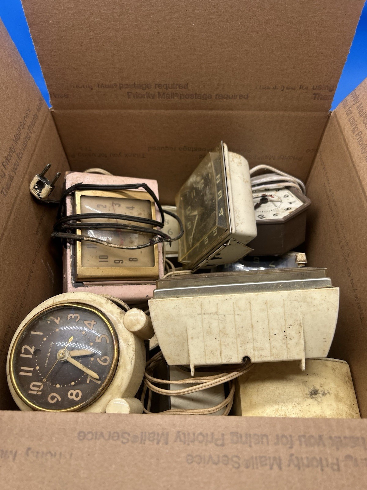 vintage mid-century General Electric (GE) and Telechron electric alarm clocks vintage mid-century General Electric (GE) and Telechron electric alarm clocks
