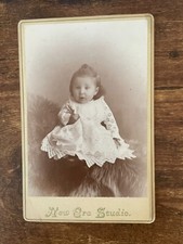 Vintage Cabinet Card. Little girl on rug. New Era Studio in Chicago, Illinois picture