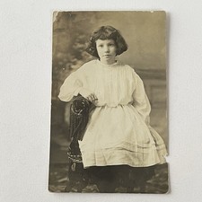 Antique RPPC Photograph Postcard Adorable Little Girl Looking Through Time picture
