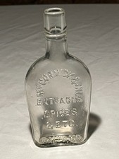 c1920s McCormick & Co. Jamaica Ginger Baltimore, MD., Pocket Size Shoofly Flask picture