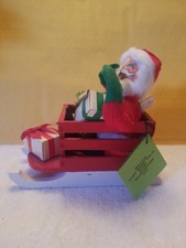 Annalee Doll Santa in Wooden Sleigh With Gifts and Holly. 1965, Vintage picture