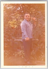 Vtg Color Snapshot Man Gray Button Shirt Outdoors Garden Flowers March 1970 picture