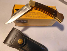 Buck 110 Folding Hunter Black/Brass Lockback Knife w/ Sheath Box picture