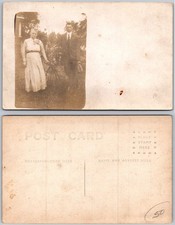 RPPC Two Adults Outdoor Portrait Photo Postcard picture