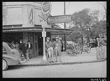 Photo:Starke Florida 1940s Soldiers Street Corner Western Auto bikes picture
