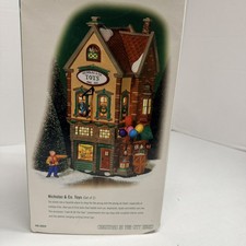 Dept 56 Xmas in the City Lighted Shop  #58929  Nicholas & Co Toys *flawed picture