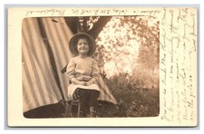 RPPC ~ Iola KS ~ Little Girl camping , So cute  ~ Kansas picture