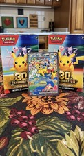 sealed 30th celebration booster bundle and mint condition 149/128 pikachu ex picture