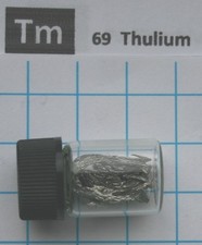 1 gram 99.9% Thulium metal pieces in glass vial element 69 sample picture