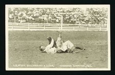 L E McCoy bulldogging a steer Winnipeg