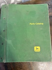 Vintage John Deere Dealer Parts Catalog with 11 Part Catalog's picture