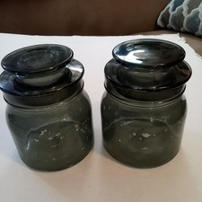 Two Matching Light Green Glass Canisters 5.5 In Tall Each Weighs Over 1 lb. picture
