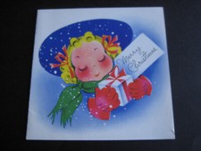1950s vintage greeting card CHRISTMAS Woman w/ Gift in the Snow picture