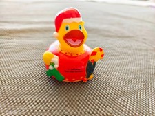 lufthansa first class duck Santa Claus with candy cane picture