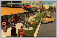 Famous Green Benches, People, Old Cars, Stores in St. Petersburg, FL. Postcard picture