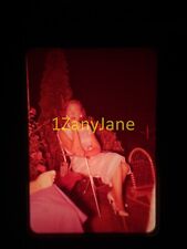 9A19 35MM SLIDE Photo , LADY SITS IN FOLDING CHAIR OUTSIDE picture