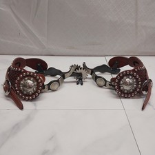 Pair of Ornate Spurs leather and steel picture