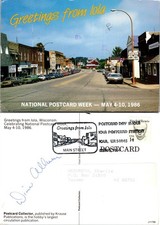 Continental Iola Wisconsin Main Street Cars Stores Postcard picture