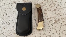 Buck 110USA Hunting Pocket Knife Lockback Ebony Wood Handle Plain Blade W/Leathe picture