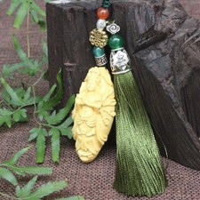 Thousand-Armed Kannon Netsuke with Strap, Wooden Carving, Elegant Accessory picture