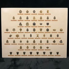 Collection of 56 Antique WWI & WWII Royal Danish Military Badges on the Board picture