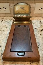Vintage New Haven Clock with Perpetual Calendar and Telephone Directory picture