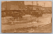 RPPC Postcard Famous for its Mud Kilgore Texas Old Car Sitting in Mud picture