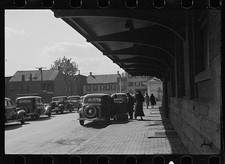 Photo:1930s Street Scene Vintage Cars Covered Sidewalk People picture