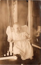 Postcard Real Photo RPPC Smiling Baby Jack in Swing August 9th, 1911, Unposted picture