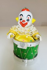 Vintage Moving Porcelain Clown in Wind-Up Musical Drum. Toy collector. Work picture