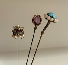 3 antique hat pins and wall hat pin holder picture