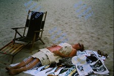 1965 35mm Slide Ocean City Maryland Sunbathing with the Baltimore Sun #2469 picture