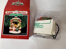Vtg Hallmark Keepsake Magic Lighted Motion Ornament Kringle's Toy Shop Christmas picture