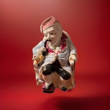 Antique Conta & Boehme Sitting Smoking Man Figural Porcelain Coin Still Bank picture