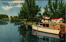 1960 Indian Rocks Beach Wood Boat Bayous Beautiful Homes Fla. VTG Postcard picture