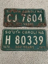 Lot of 2 different 1970 South Carolina License Plate Tag Pair 300 Years picture